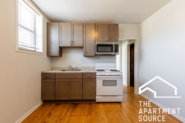 Building Photo - 4810 W Armitage Ave Unit 1R