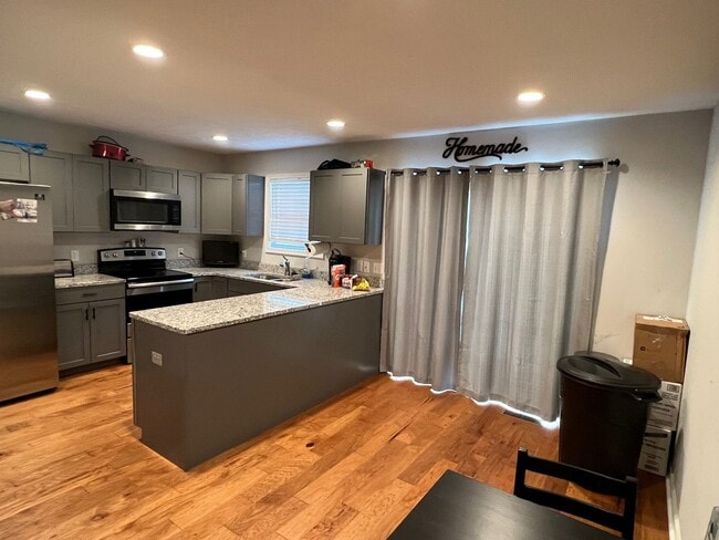 Photo - End Unit Townhouse with Garage and Unfinished Basement