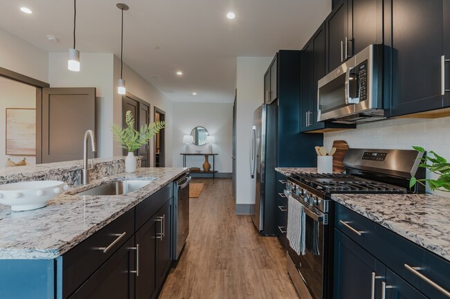 Building Photo - Modern Apartments Conveniently Located off... Unit 211