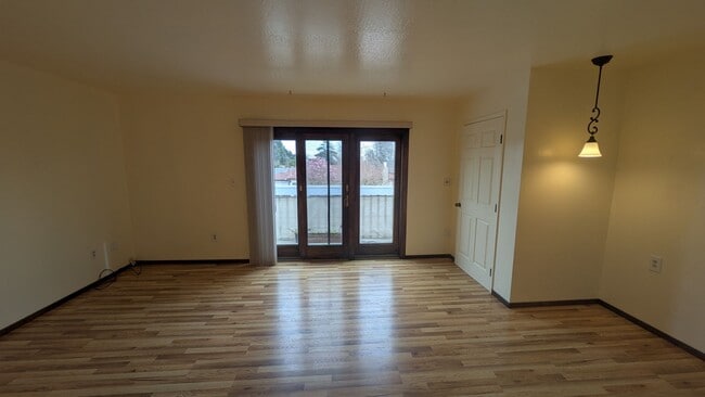 Photo - Bright Upstairs Studio with Deck & Peek of the Ocean | Utilities Included