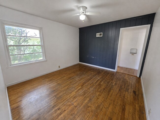 2 Bedroom, 1 Bathroom West Hill Home with Fenced Yard, Garage, & Bonus Living Space