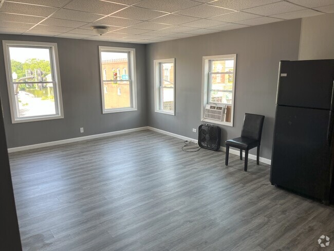 Building Photo - 505 E 3rd St Unit 3 Rental