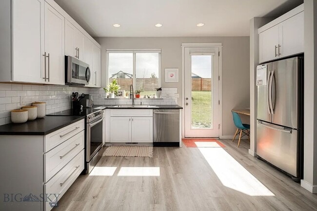 Photo - Charming Three Bedroom Home with Large Fenced Yard