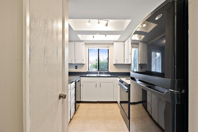 Photo - Light & Airy 2-Bedroom Tumwater Apartment with Pool, Covered Parking & Full-Size W/D