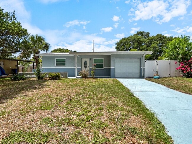 Building Photo - Move-In Ready Pool Home in Gem Village – Coastal Retreat with Modern Updates - 2bed|1 bath