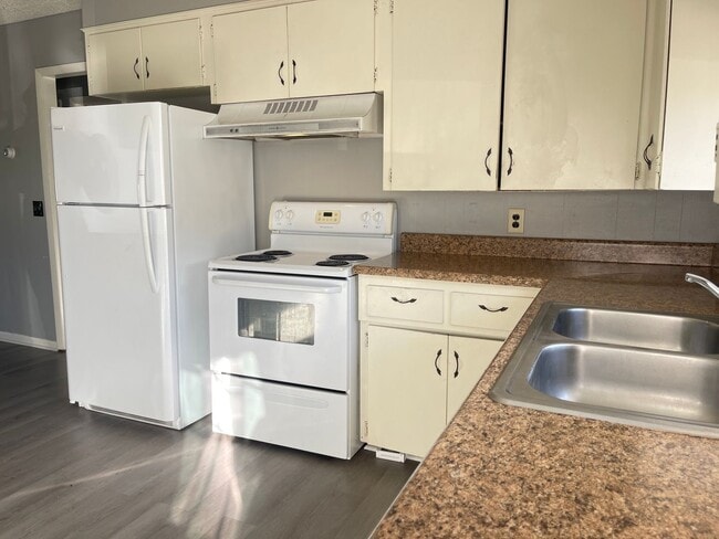 Building Photo - 5377 S Hutchinson Ct Unit C5