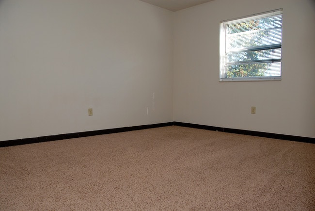 Spacious Master Bedroom - University Hilltop Apartments