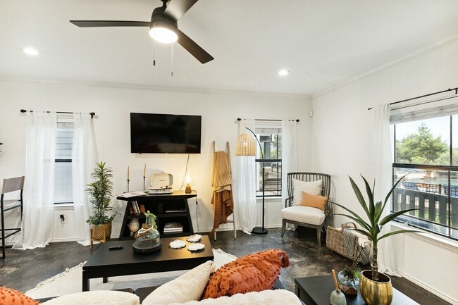 Living Room - Renovated Unit - Facing TV - The Village on Telluride Apartments