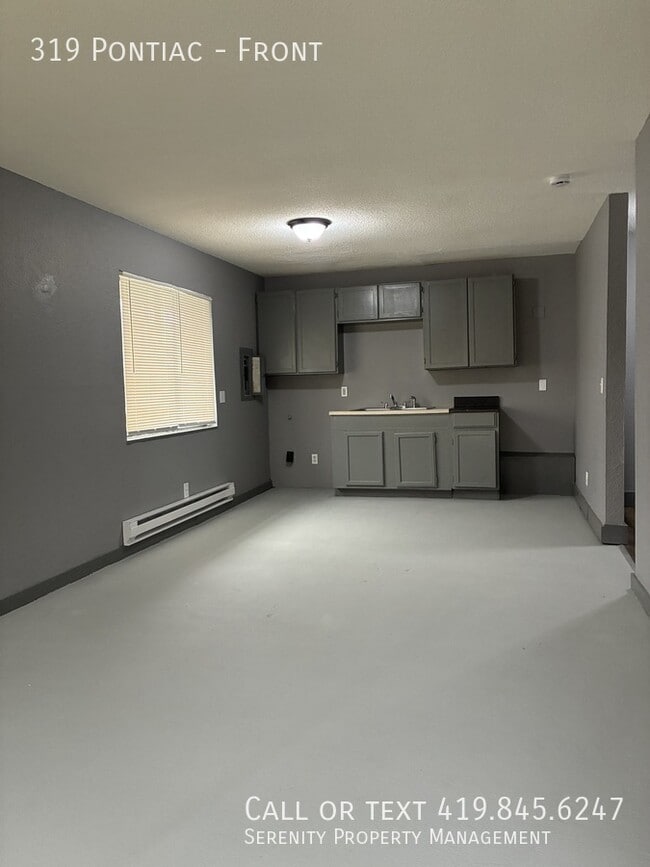 Building Photo - 319 Pontiac-Front Unit Front