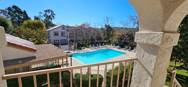 Front porch view of pool - 13020 Wimberly Sq Unit 16