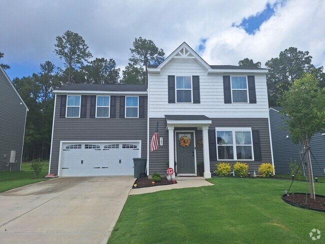 Building Photo - Outstanding Four Bedroom Home Less Than 10...