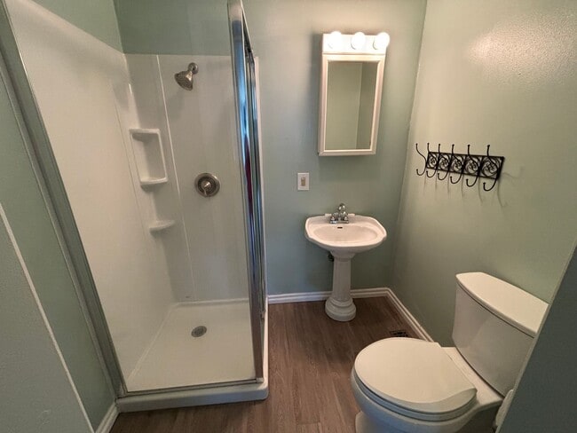 Photo - Welcome to this charming 3-bedroom, 2-bathroom home located in the desirable west side of Russell...