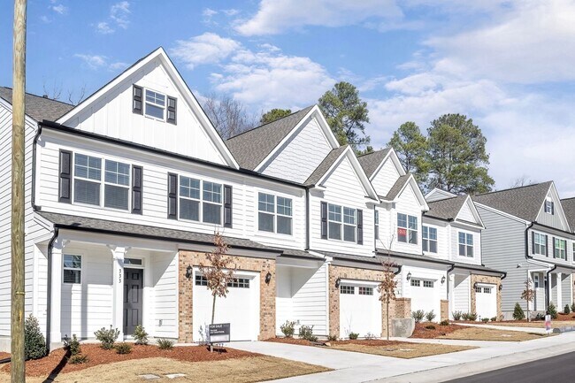 Photo - Updated Townhome with 1 Car Garage - close to Southpoint!