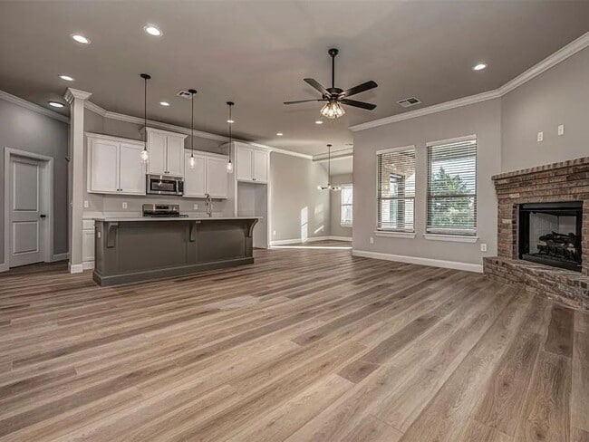 Photo - Modern 4-Bed, 2-Bath Mustang Home with 3-Car Garage!