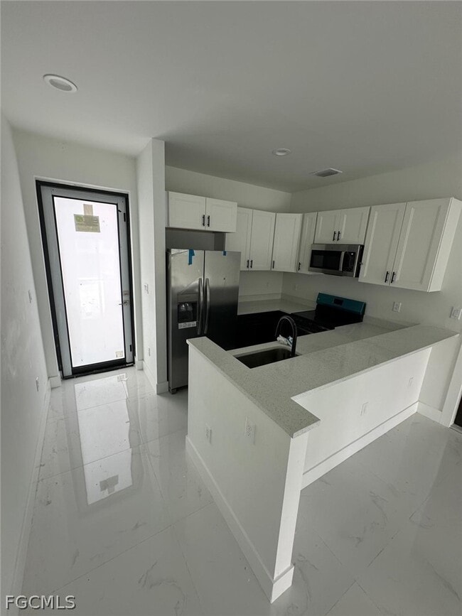 Photo - 465 Petite Ave