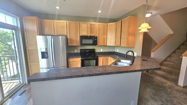 Photo - 2 bed 1.5 bath Apple Valley townhome available 6/15/2026 – Perfectly Efficient & Cozy!"