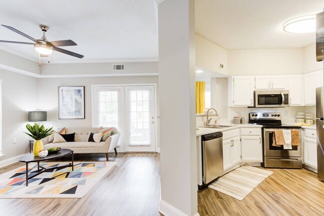 Living Room and Kitchen with Hardwood-Style Flooring