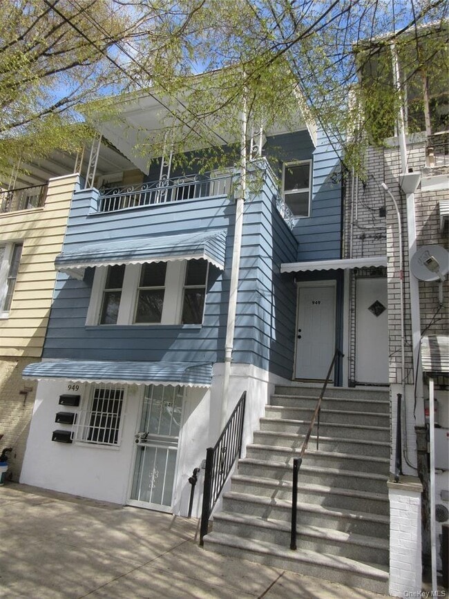 Building Photo - 949 E 213th St Unit FL-2