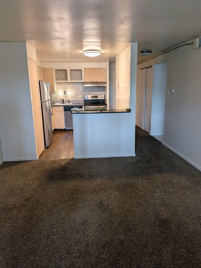 Building Photo - 8824 E Florida Ave Unit 212