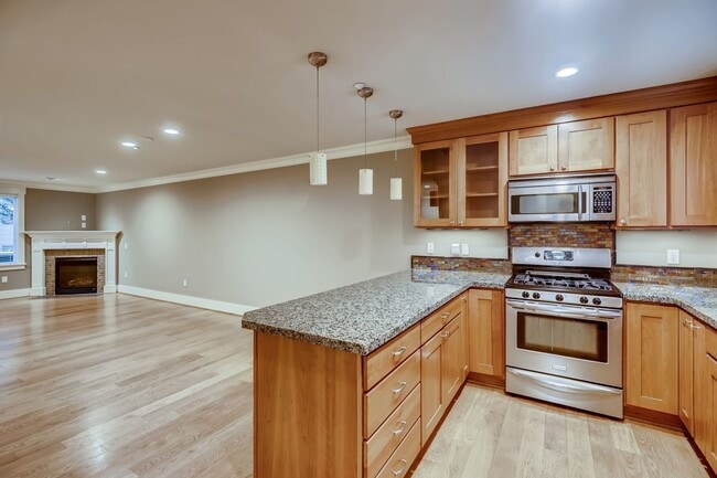 Photo - Immaculate 5 bedroom townhome available for instant move-in.