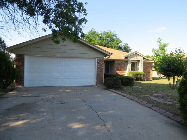 Photo - "Charming 3-Bedroom Oasis with Granite Touches & Cozy Fireplace on Sagebrush Drive!"