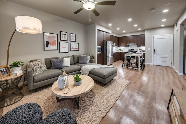 One bedroom model showing living room and kitchen - Talavera