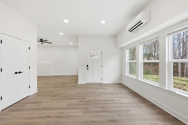 Photo - Stunning lakeside new construction: 4 bedroom and 3 bath home