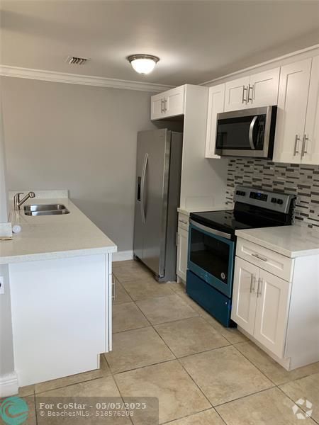Building Photo - 4111 Stirling Rd Unit 401 Rental