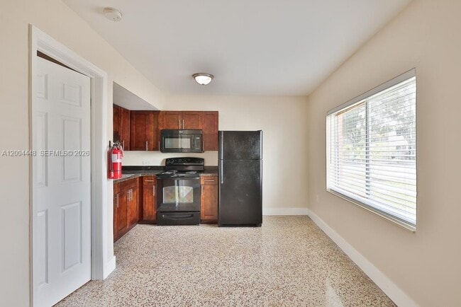 Building Photo - 6001 NW 14th Ave Unit 3