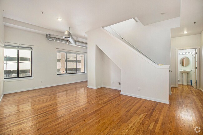 Building Photo - Unique 2-Story Loft-Style Condo w/1200 sqf...