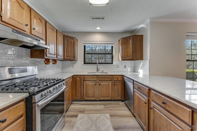 Photo - East Fayetteville 3-Bedroom Home with Granite Touches & Cozy Fireplace!"