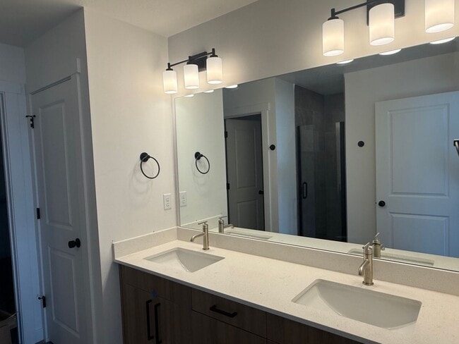 Photo - Half off first months rent - Beautiful new construction town home with central air, EV charging, ...
