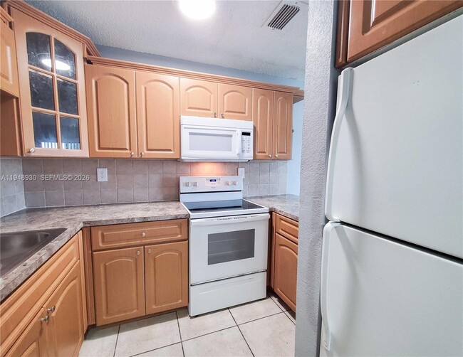 Building Photo - 1519 W 42nd Pl Unit 17