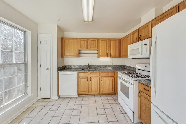 Photo - READY TO GO!!! Renovated 2BD/2BA with 1 Reserved Parking Space & screened in rear porch Unit A102