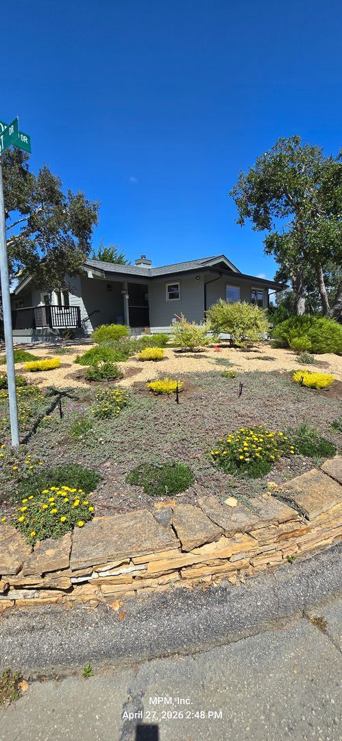 Photo - large custom home with peek a boo ocean views