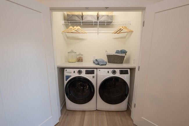 Washer & Dryer with Folding Station in Apartment