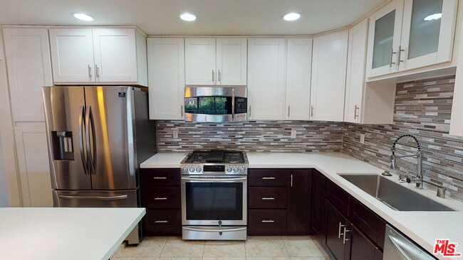 Building Photo - 4520 Natick Ave Unit 307