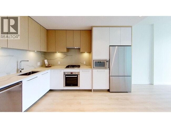 Photo - 567 Clarke Rd Unité 9xx