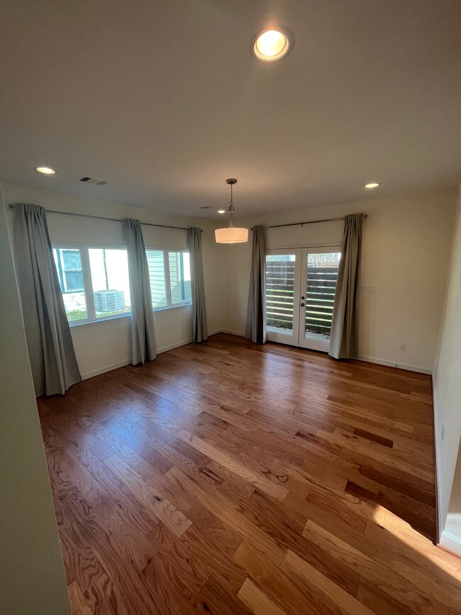 Well lit living room - 4388 Varsity Ln House Unit A
