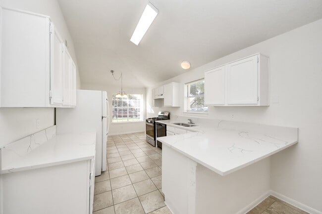 Building Photo - 6711 Autumn Flowers Dr Rental