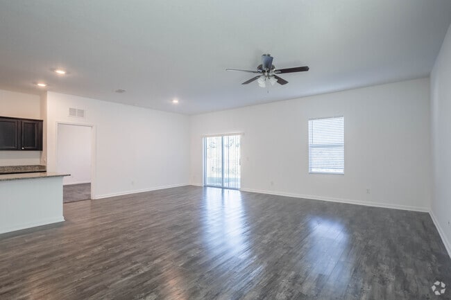 Firefly - 4BR, 2BA - 1,827SF - Livingroom & Dining Room - Estates at Fort King