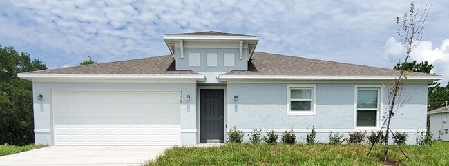 Building Photo - SPACIOUS 3/2 HOME IN PALM BAY