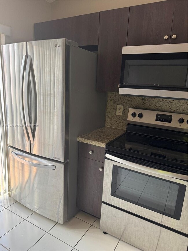 Building Photo - 7794 W 29th Ln Unit 201-29