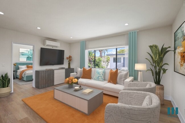 Living Room with Large-Size Windows, Vinyl Flooring, and Recessed Lighting - Penmar Superba by Wiseman