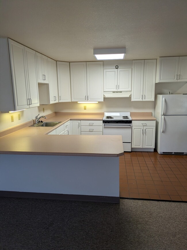 Building Photo - 223 S Camp Ave Unit Unfurnished Apartment