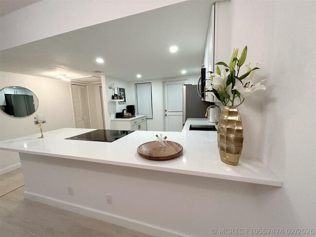 Building Photo - 3000 N Palm Aire Dr Unit 103