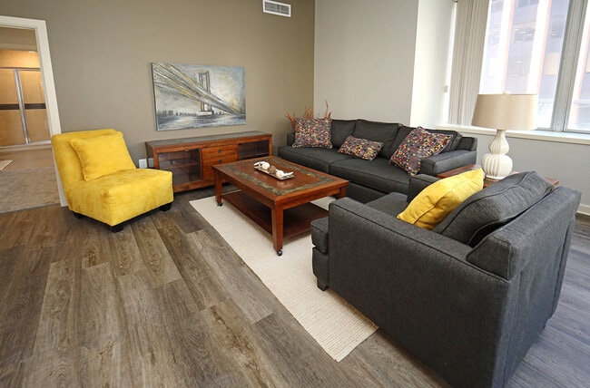 Updated Model Suite with All New LVT Hard Surface Flooring - Living Area