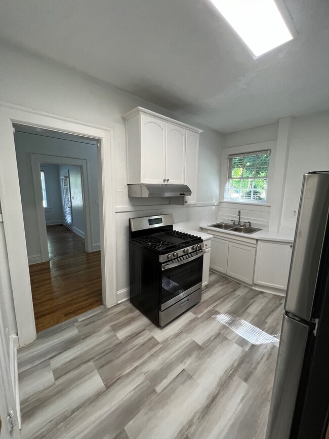 kitchen to dining nook - 1304 N Morningside Dr NE Unit Right