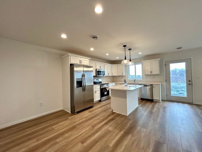 Photo - Spacious & Stylish 3-Bed Home with Modern Finishes and Attached 2-Stall Garage