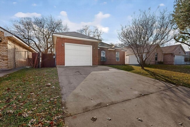 Photo - Move-In Ready 3-Bedroom Home with Garage and Private Backyard